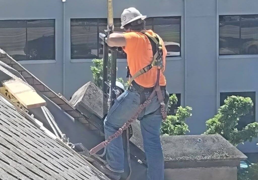 Reniassance worker on roof