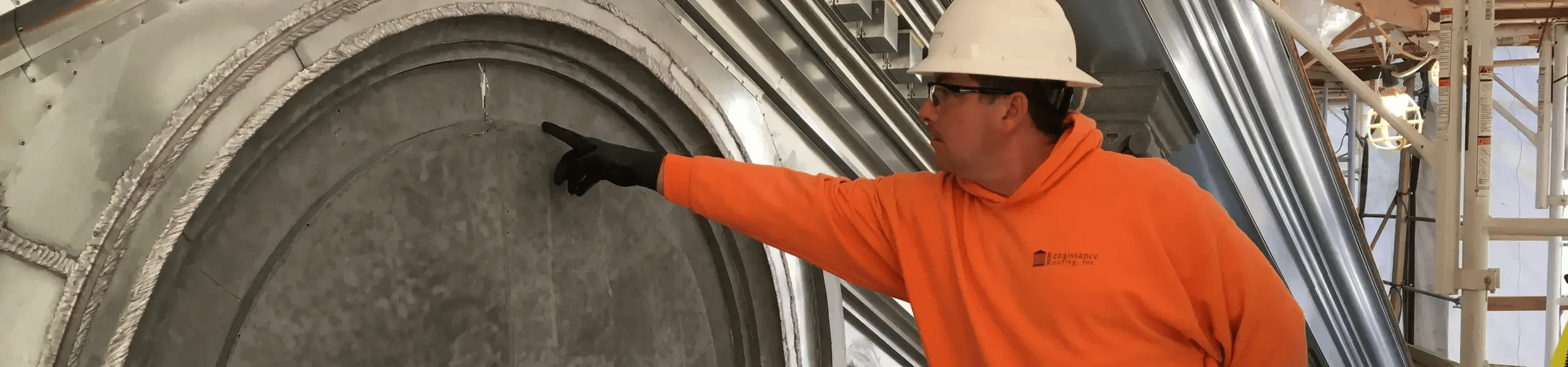 Renaissance restoration worker pointing out flaw in copper ornamentation