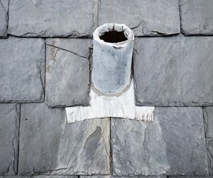Leaking plumbing stack replaced on slate roof