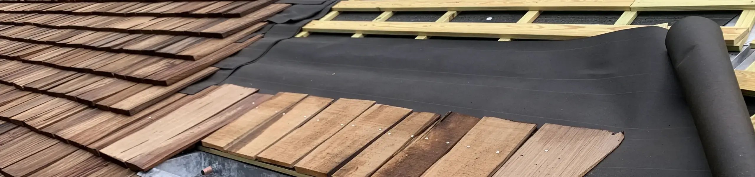 wooden roof being repaired after damage
